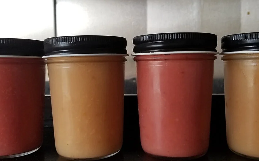 Amber glass jars of preserves